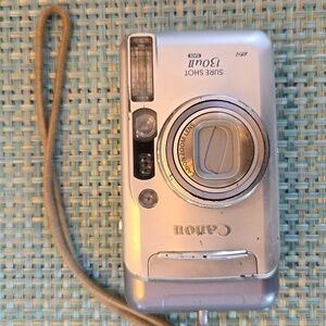 2005 Canon point and shoot film camera with a telephoto zoom